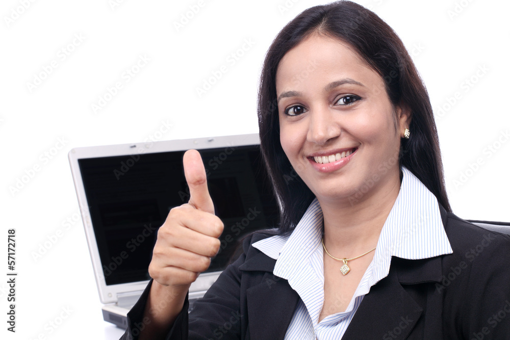Happy young buisiness woman showing thumbs up Happy young buisiness woman showing thumbs up