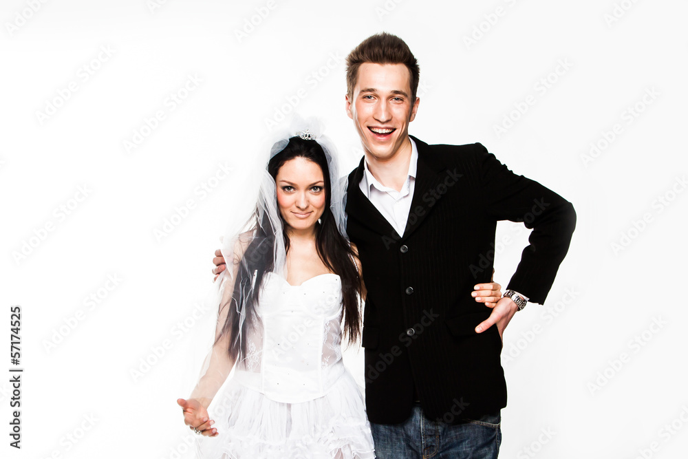 Beautiful and young married couple isolated on a white backgroun Beautiful and young married couple isolated on a white backgroun
