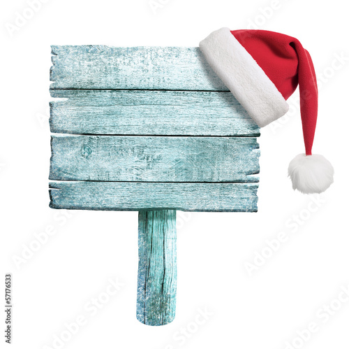 frozen wooden sign with red Santa's hat