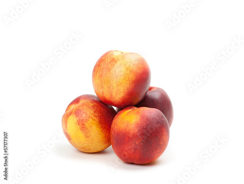 Ripe peaches fruits isolated on white © Vasily Merkushev
