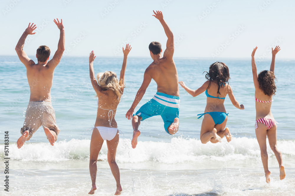 Group of friends having fun on the beach Group of friends having fun on the beach
