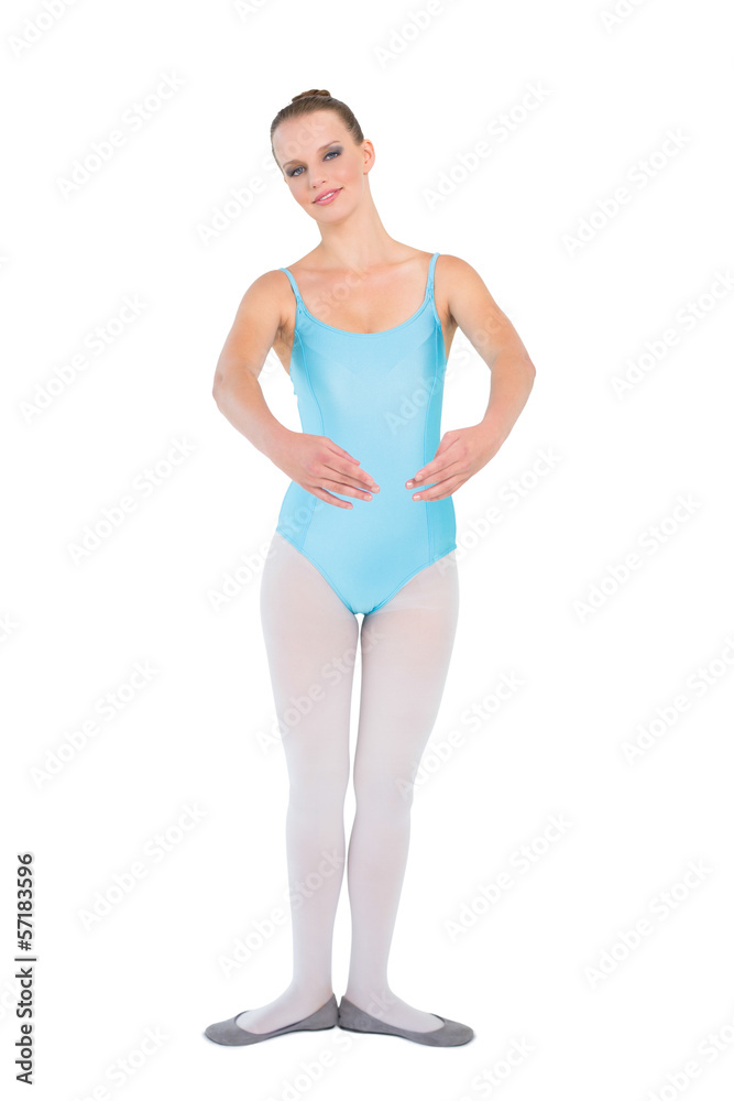 Happy pretty ballerina posing looking at camera Happy pretty ballerina posing looking at camera