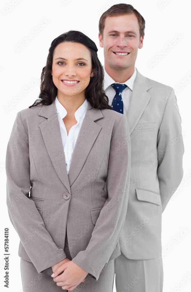 Smiling office staff standing together Smiling office staff standing together