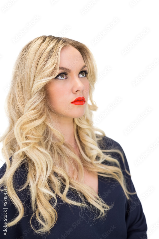 Thoughtful gorgeous blonde with red lips posing Thoughtful gorgeous blonde with red lips posing