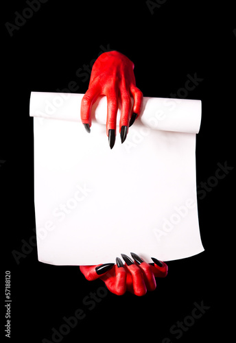 Red devil hands holding paper scroll