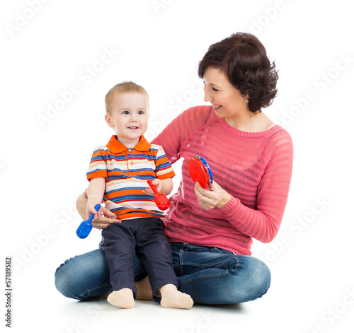 Mother and baby boy play wi...