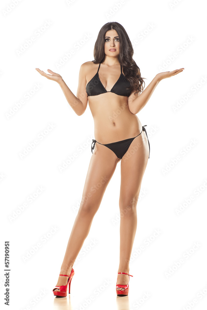 beautiful girl with a questionable gesture posing on white beautiful girl with a questionable gesture posing on white