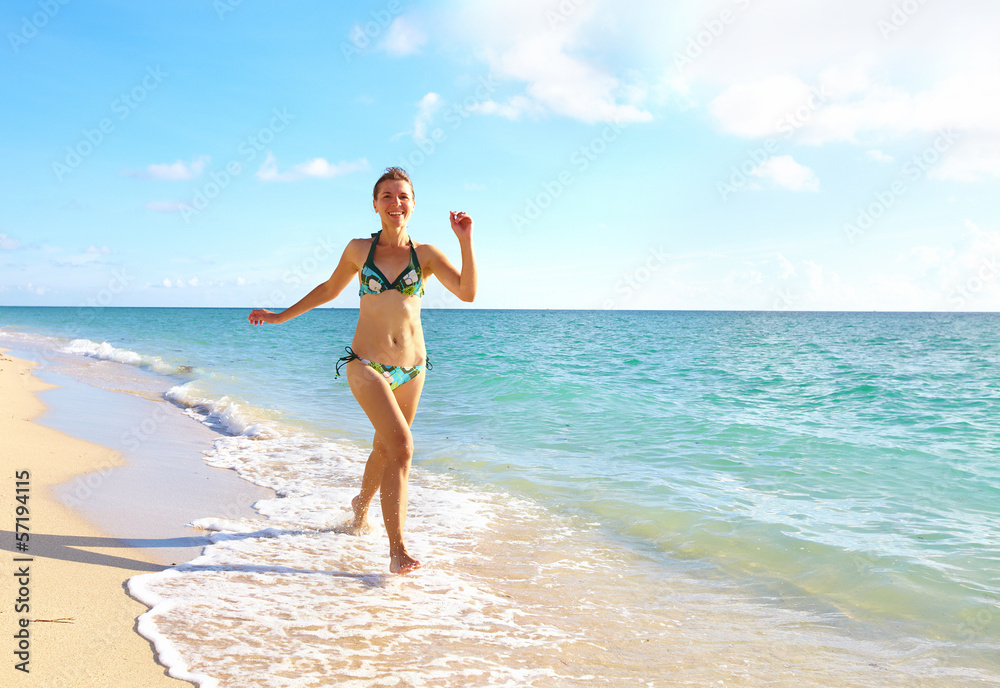 Happy woman on Miami beach.