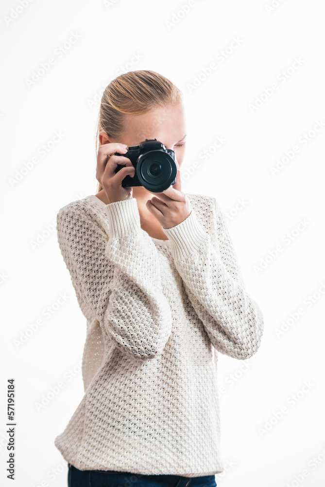 Young girl with digital camera, taking a picture Young girl with digital camera, taking a picture