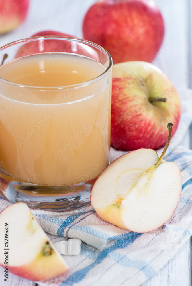 Glass filled with fresh Apple Juice Glass filled with fresh Apple Juice