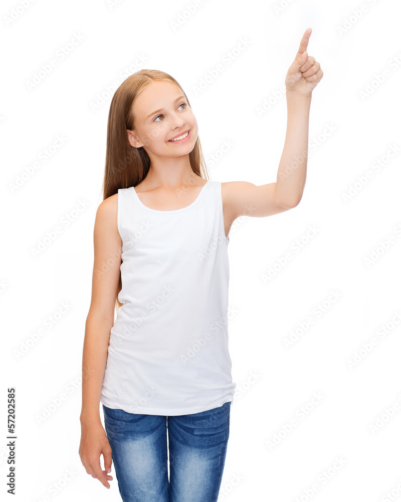 girl in blank white shirt pointing to something