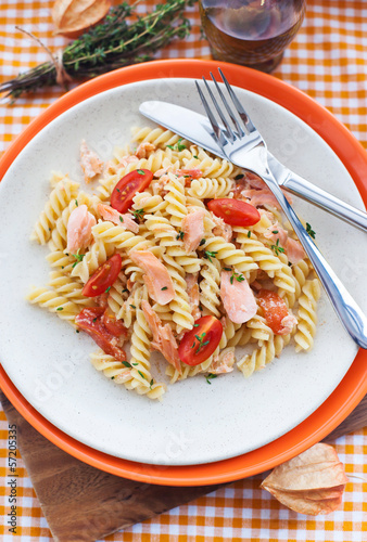 Fusilli pasta with smoked salmon and tomatoes