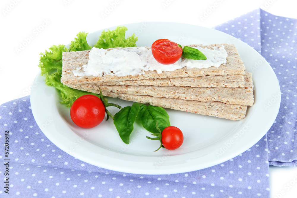 Tasty crispbreads with vegetables, isolated on white Tasty crispbreads with vegetables, isolated on white