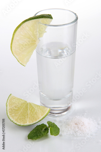 Tequila in glass isolated on white © Africa Studio