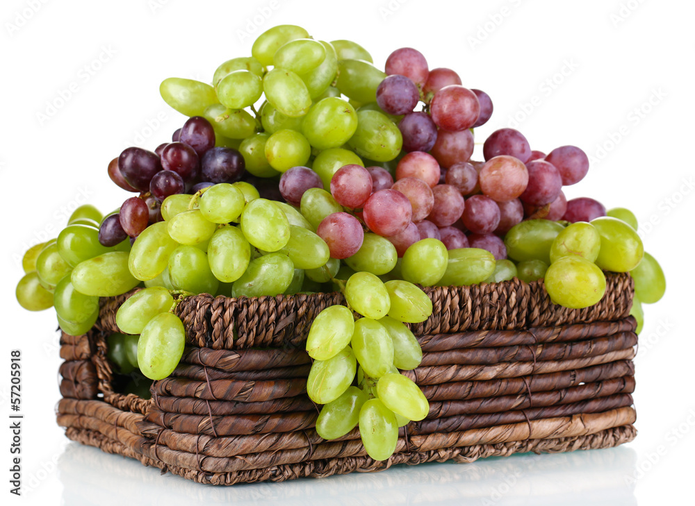 Ripe green and purple grapes in basket isolated on white Ripe green and purple grapes in basket isolated on white