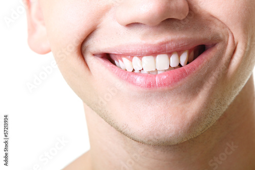 Beautiful wide smile of young man with great healthy white teeth