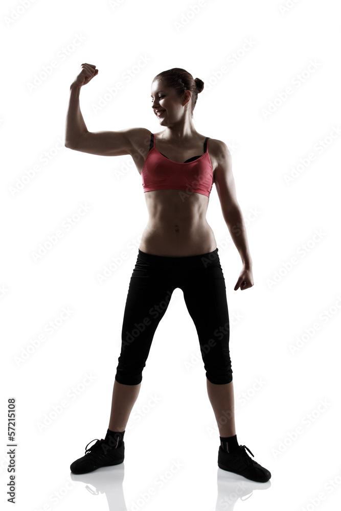 sport woman show biceps, full length portrait, silhouette studio sport woman show biceps, full length portrait, silhouette studio