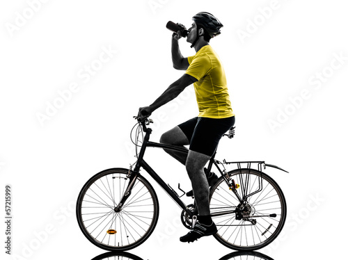 Fototapeta Naklejka Na Ścianę i Meble -  man bicycling  mountain bike drinking silhouette