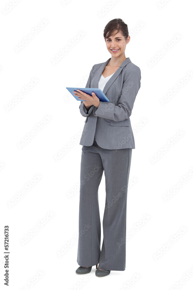Smiling businesswoman with tablet computer Smiling businesswoman with tablet computer