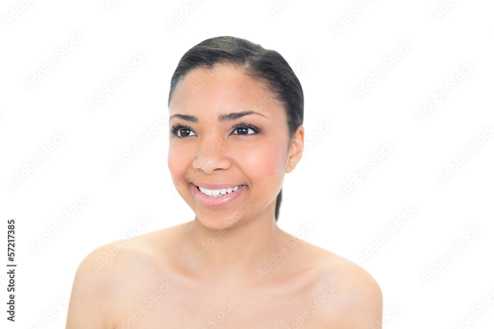 Smiling young dark haired model looking away Smiling young dark haired model looking away
