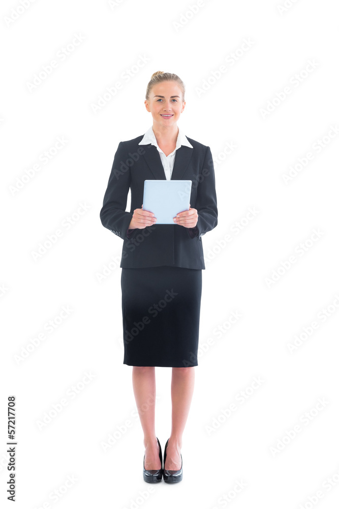 Pretty young businesswoman holding her tablet Pretty young businesswoman holding her tablet
