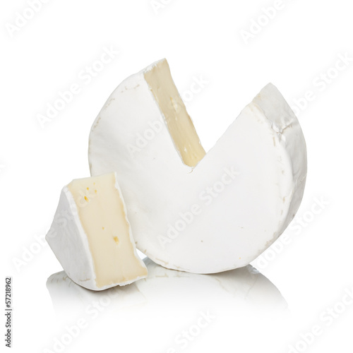 Round camembert cheese with a cut out piece