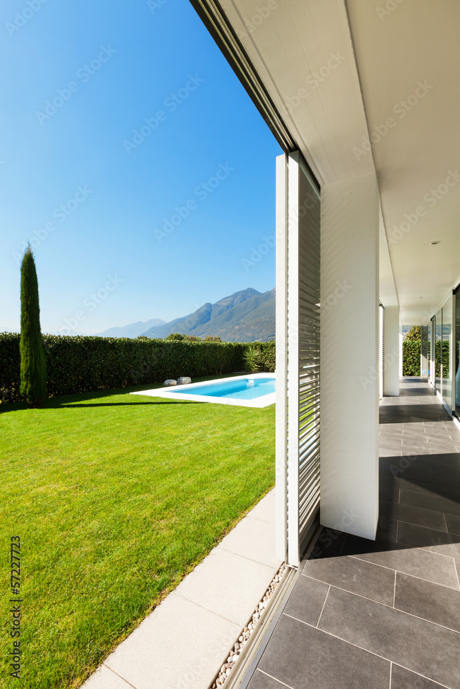Fototapeta premium Modern villa with pool, view from the porch