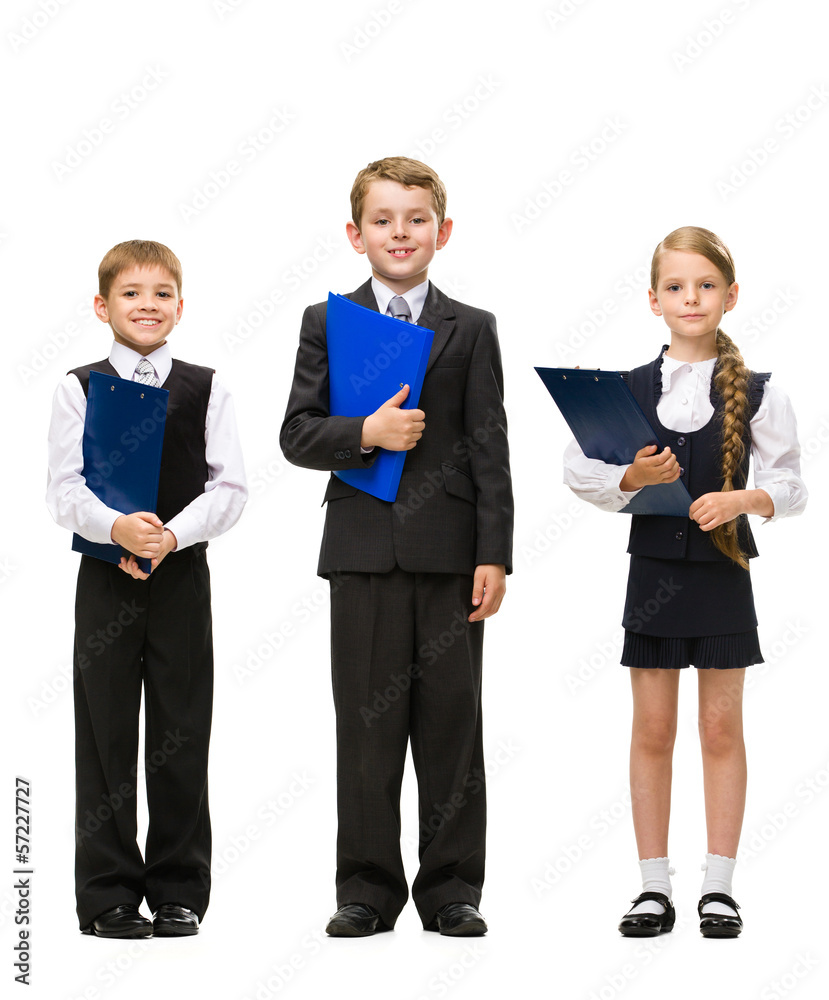 Full-length portrait of little children with folders, isolated Full-length portrait of little children with folders, isolated