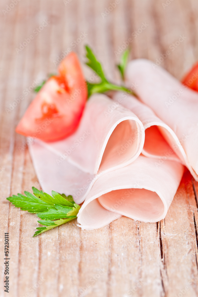 slices of ham with parsley and tomato slices of ham with parsley and tomato