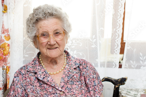 Senior woman portrait in her room
