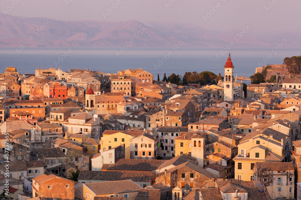 the city of Corfu during the sunset on a sunny day