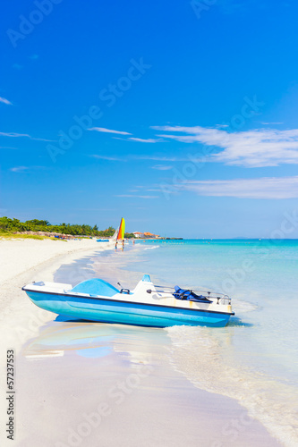 Photography Varadero beach in Cuba with a paddle boat in the foreground