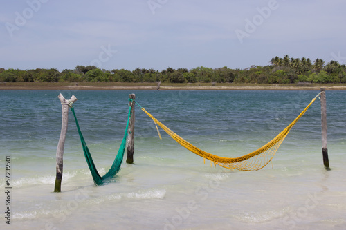 Green and yellow hammocks at Jericoacoara, Brazil