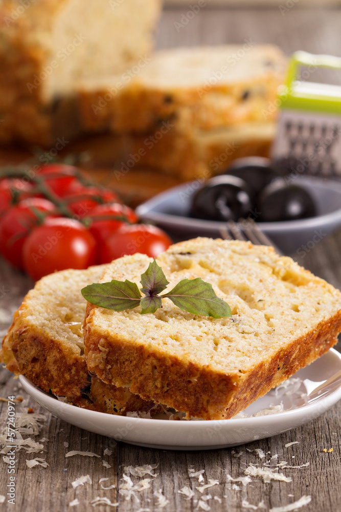 Savoury loaf cake with tomatoes, cheese and olives Savoury loaf cake with tomatoes, cheese and olives