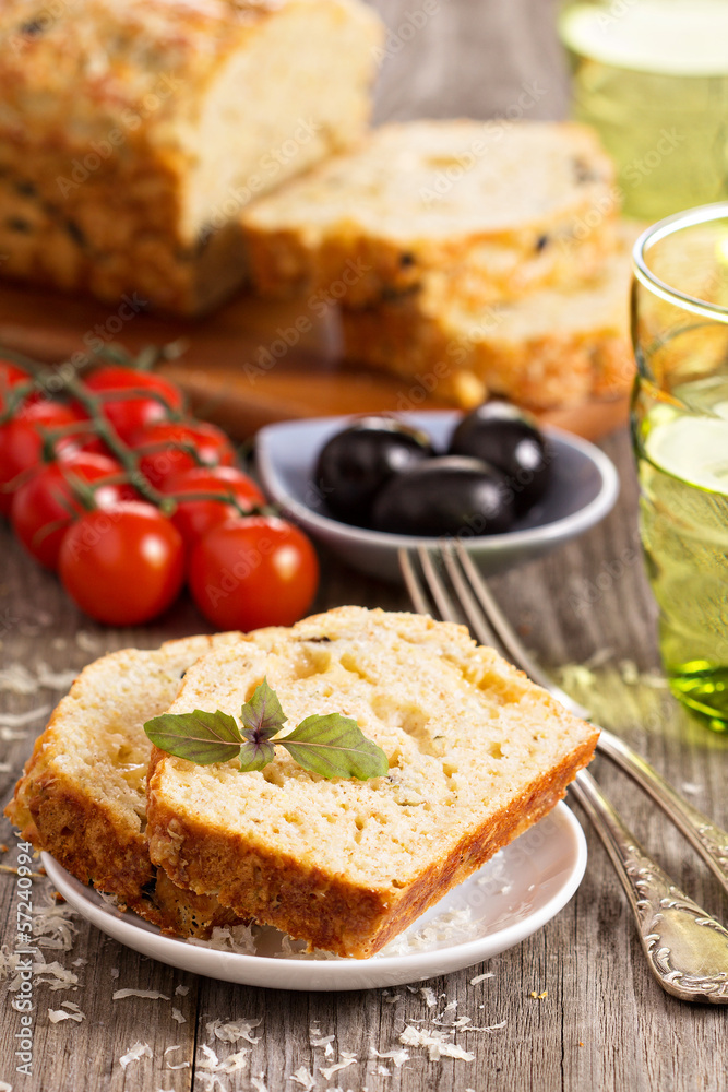 Savoury loaf cake with tomatoes, cheese and olives Savoury loaf cake with tomatoes, cheese and olives