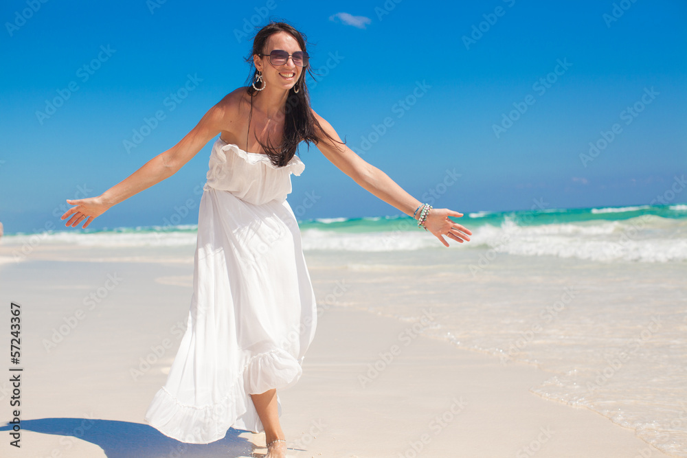 Portrait of Young woman enjoying the holiday on a white,