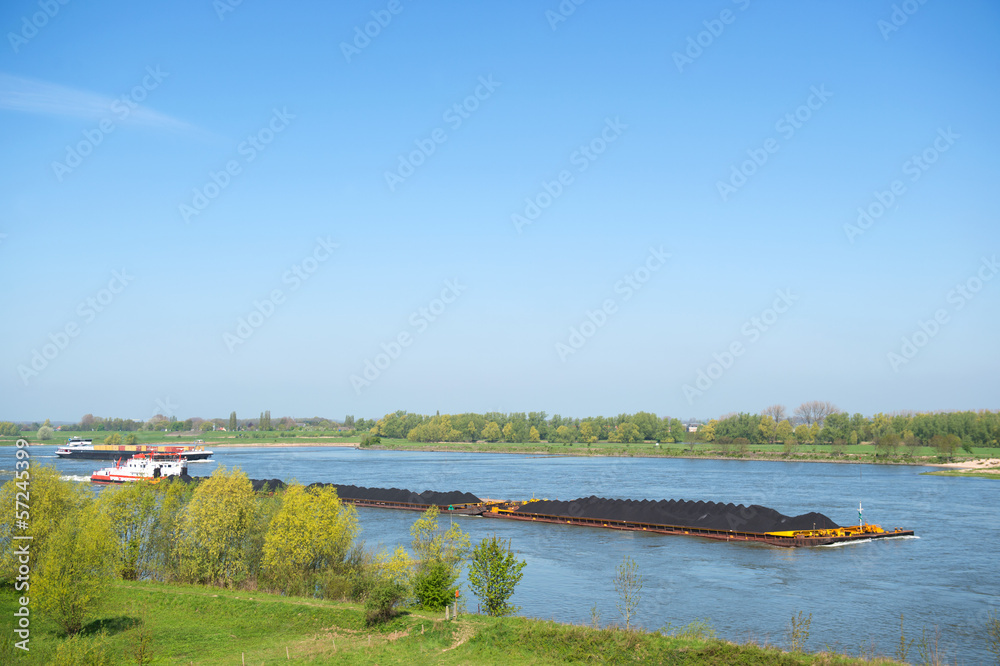 Big cargo ships in Dutch landscape