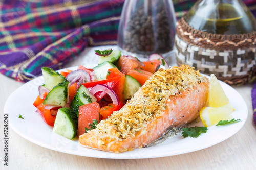 Steak fillet of red fish salmon with cheese crust breading