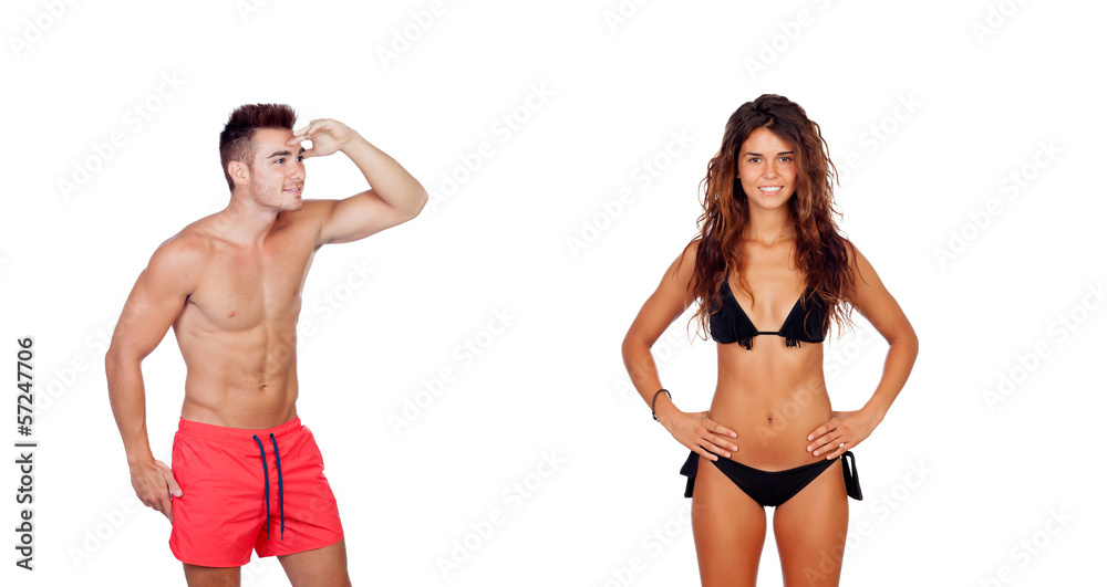Young boy in swimwear looking at a sexy girl in bikini Stock Photo | Adobe  Stock