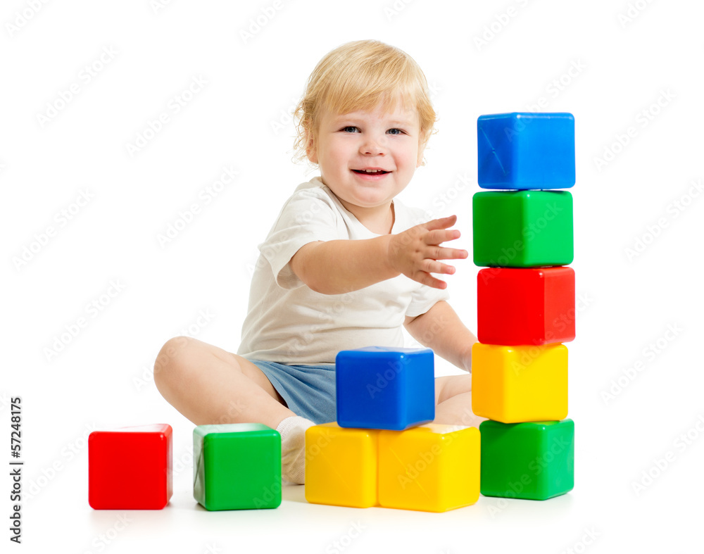 kid building tower using colorful blocks kid building tower using colorful blocks
