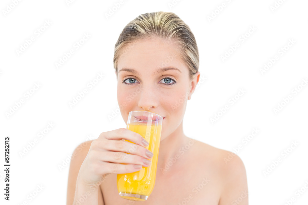 Natural fresh blonde woman drinking orange juice Natural fresh blonde woman drinking orange juice