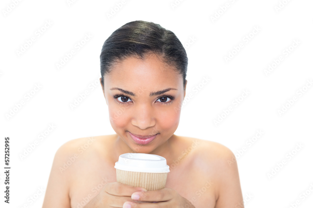 Attractive young dark haired model holding coffee cup Attractive young dark haired model holding coffee cup