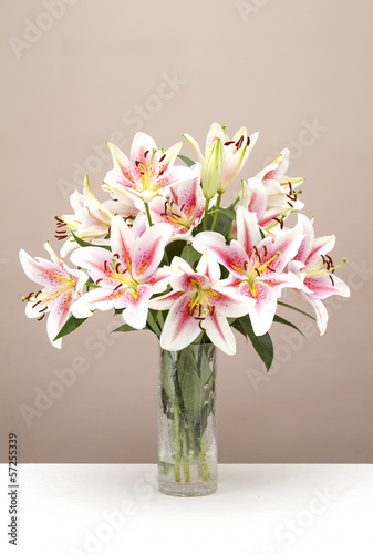 Bouquet of pink lillies in a glass vase