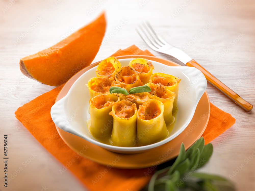 paccheri with pumpkin and mozzarella, selective focus paccheri with pumpkin and mozzarella, selective focus