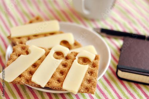 Light snack: crispbread and Emmental cheese photo