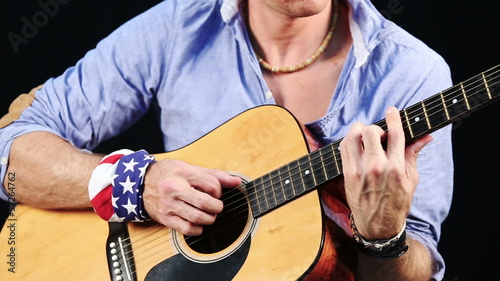 Young Man Playing Guitar photo