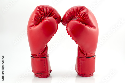 Boxing gloves on a white background close up © piyathep