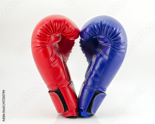 Boxing gloves on a white background close up © piyathep