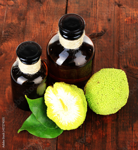 Osage Orange fruits (Maclura pomifera) and medicine bottles, photo