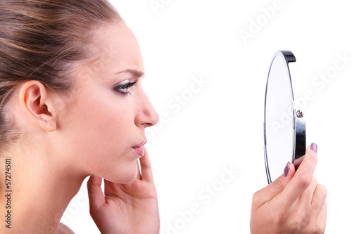 Beautiful girl preens befor...